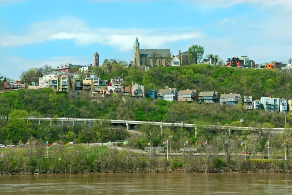 Holy Cross Immaculata Church sits atop Mt Adams in Cincinnati, as seen from across the Ohio River in Kentucky.